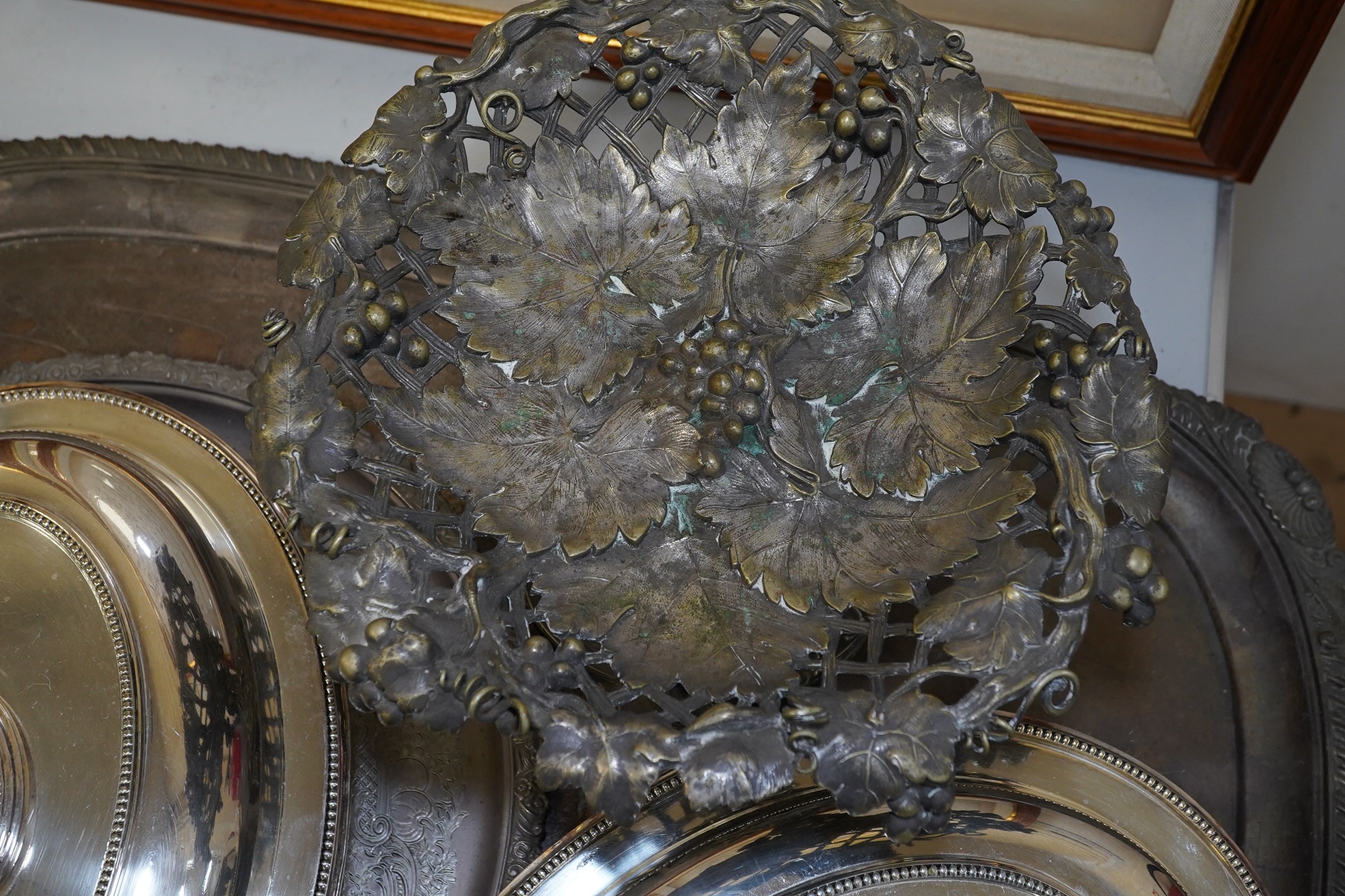 A plated tray and salver, entree dishes and a vineous pedestal dish, tray 76cm wide. Condition - tray and salver plate worn